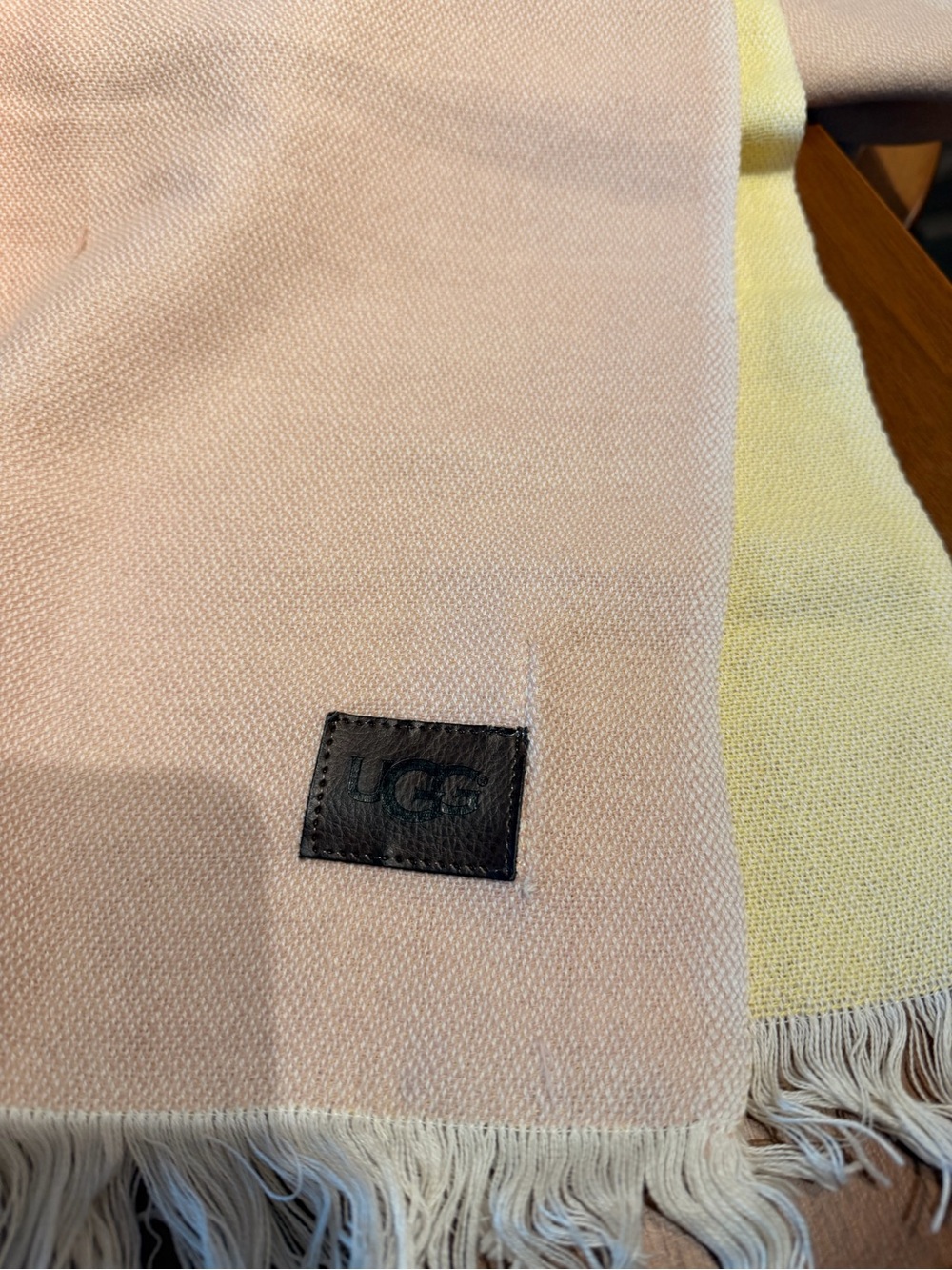 UGG Pale Pink and Soft Yellow Woven Fringe Throw